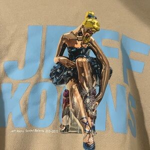 Uniqlo Beige Sweater with Blue and Yellow Graphic